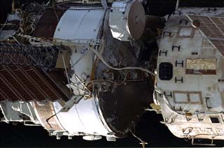 Survey views of the Mir space station taken by the crew of the STS-86 orbiter Atlantis including Base Block (right) and Kvant-1 (left) modules.